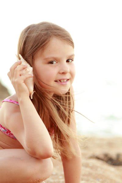 Little cute girl on beach — Stock Photo © Mari1Photo #29243863