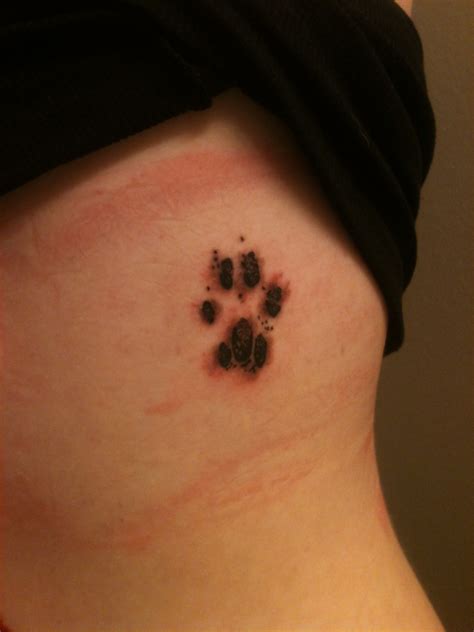 cat paw prints tattoo 2