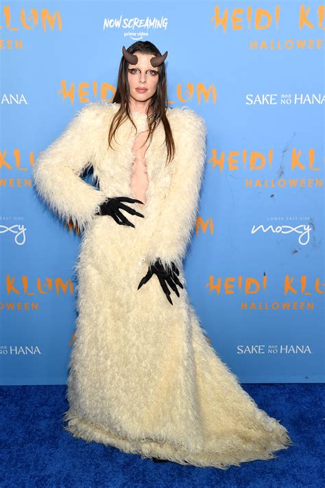 Julia Fox bares her claws in wild furry outfit at Milan Fashion Week