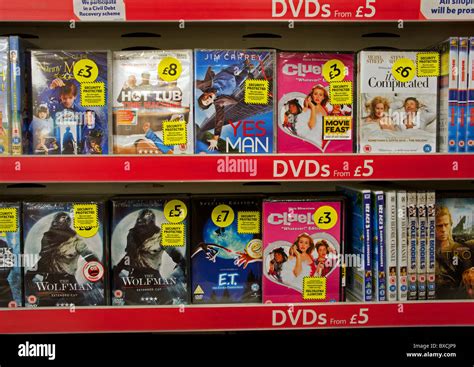 DVDS for sale in UK supermarket Stock Photo - Alamy