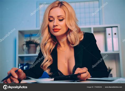 Blonde Sexy Woman Decollete Reading Something Office Stock Photo by ...