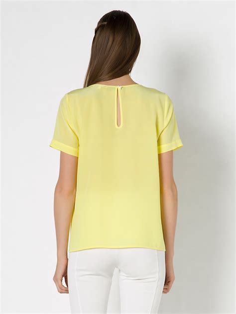 women yellow blouses 2