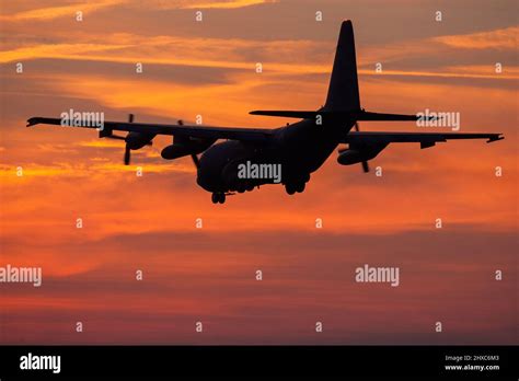 C-130 Hercules during a sunset landing at Eindhoven airport Stock Photo ...