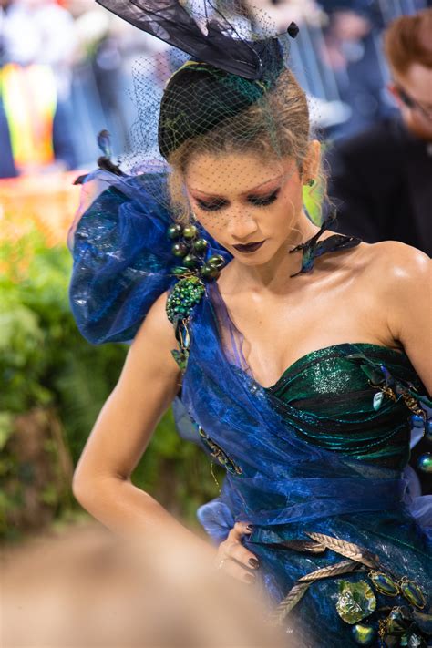 kim kardashians metallic lace margiela dress shines  met gala