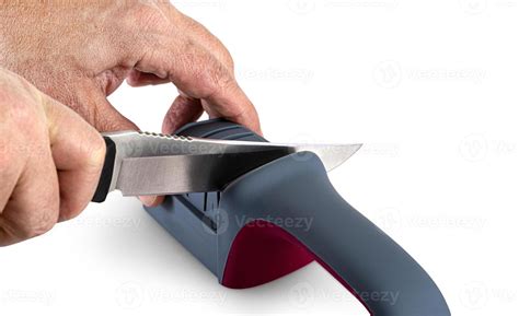 Sharpening knife process isolated on white background 16864112 Stock ...