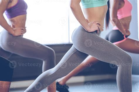 Feel burn in buttocks. Side view part of young women with perfect