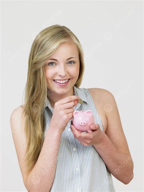 Teenage Girl Putting Money Into Piggy Bank Background, Finance, Into