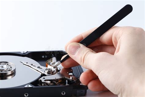 Closeup View of a Computer Hard Disc in Repair Prosess Stock Photo ...