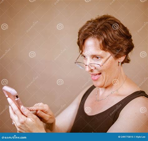 Attractive Mature Woman on Her Phone Stock Image - Image of hair, adult
