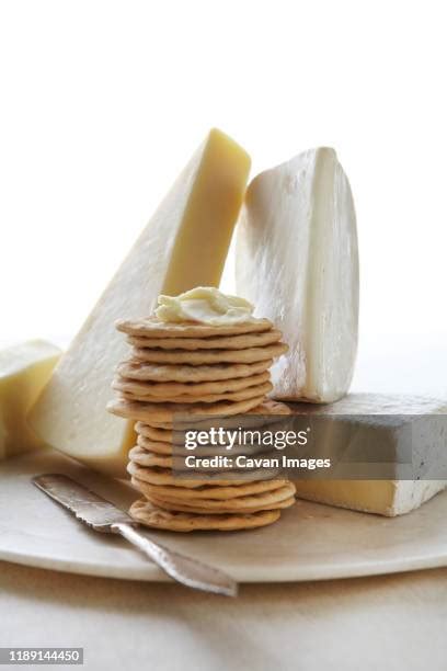cheese spread cracker   premium high res pictures getty images