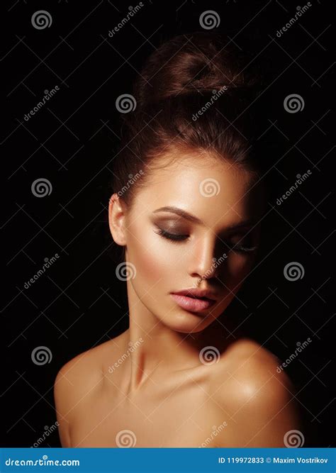 Elegant Portrait Of A Appealing Naked Brunette With Full Lips And