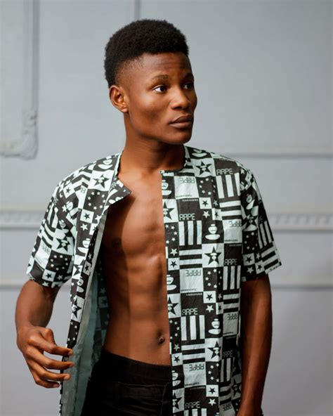 Download "A man showcasing his well-built six-pack abs" | Wallpapers.com