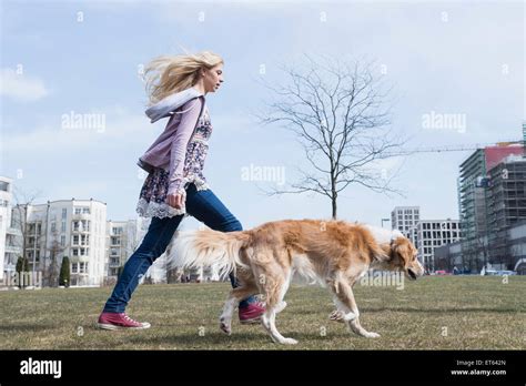 Teenage Girl Walking Dog Stock Photos & Teenage Girl Walking Dog Stock ...