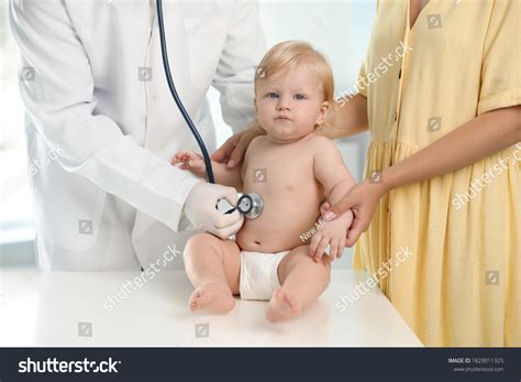 pediatrician examining baby stethoscope hospital health stock photo