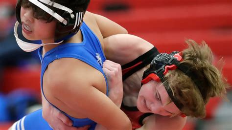 See action of Neenah vs Oshkosh West wrestling dual