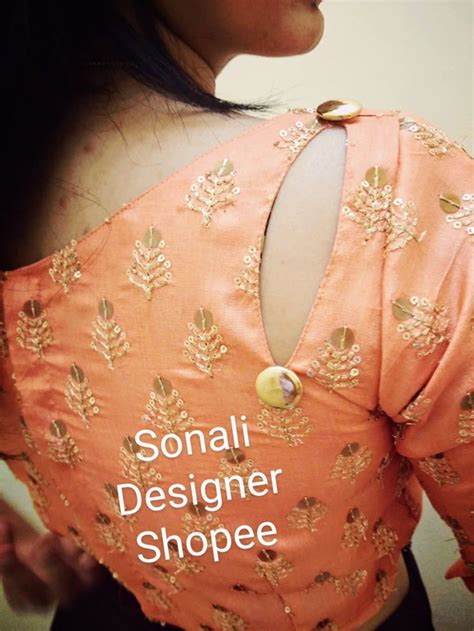 Key hole one side | Casual blouse designs, Back dress design, Designer