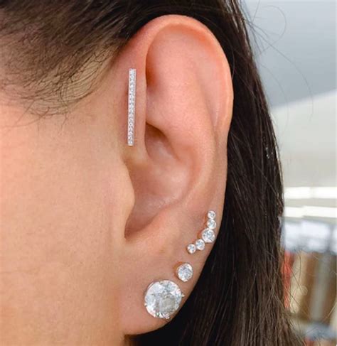 Triple Forward Helix Ear Piercings