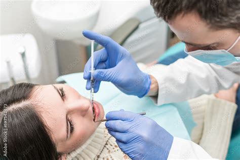 Dentist makes an anesthetic injection for the patient Stock Photo ...