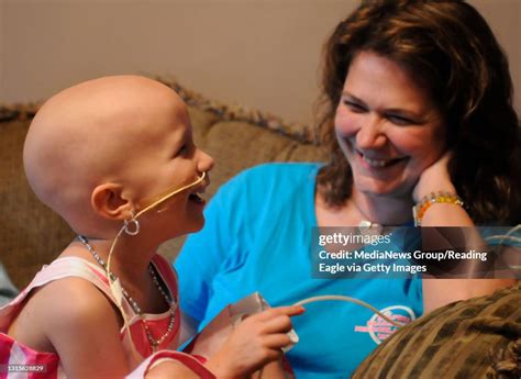 Kiki and Kim share a laugh. Kiara gets liquid food through a tube in ...