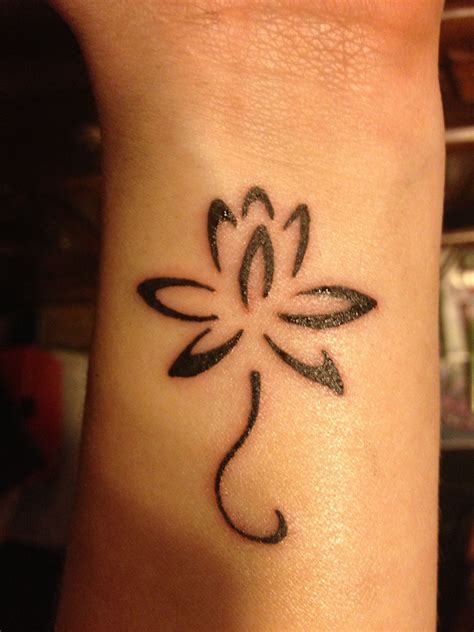 flower tattoo in wrist 2