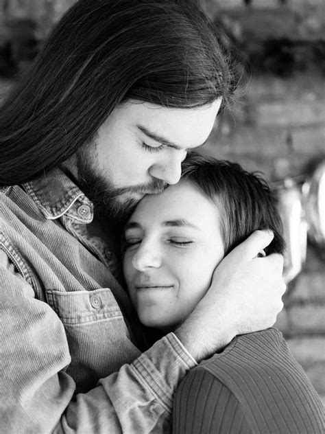 Download Show your love with a forehead kiss | Wallpapers.com