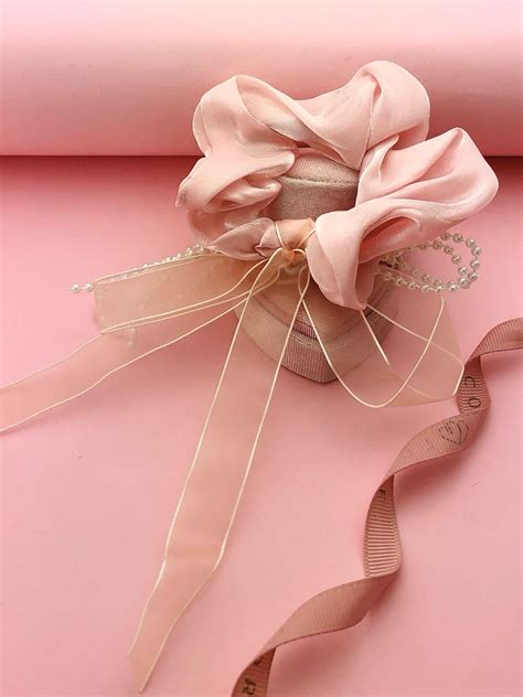 Gumka różowa z kokardą i perełkami - Coralove