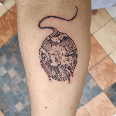 My custom made Crimson Behelit tattoo. : r/Berserk