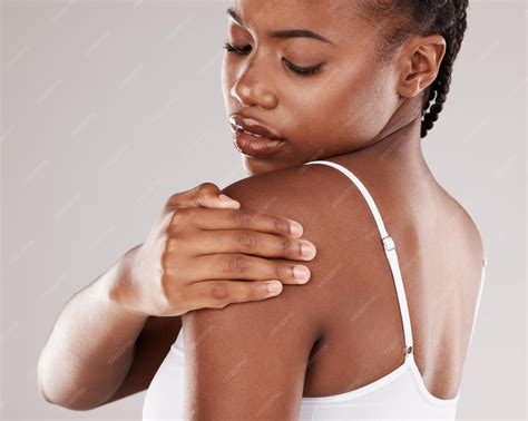 Premium Photo | Black woman shoulder pain and injury with health risk