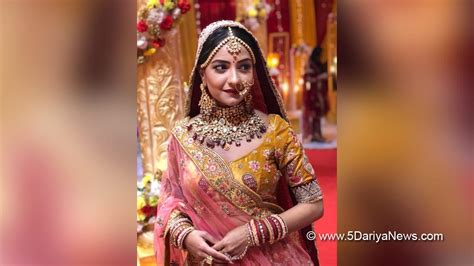 akshita mudgal wore   kg lehenga  wedding sequence  iss