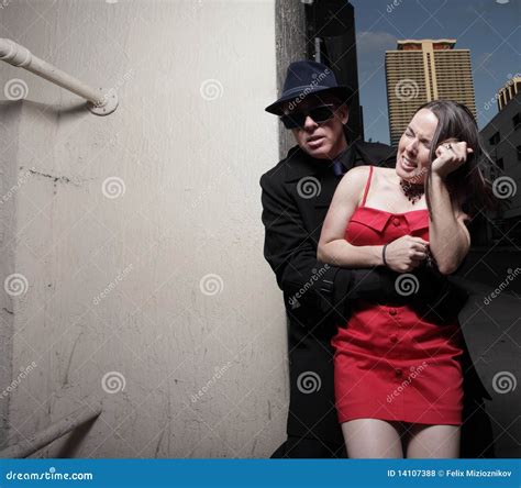 Man grabbing the woman stock photo. Image of attack, attractive - 14107388