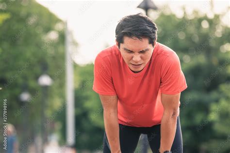 tired man runner   rest  running hard  city road tired