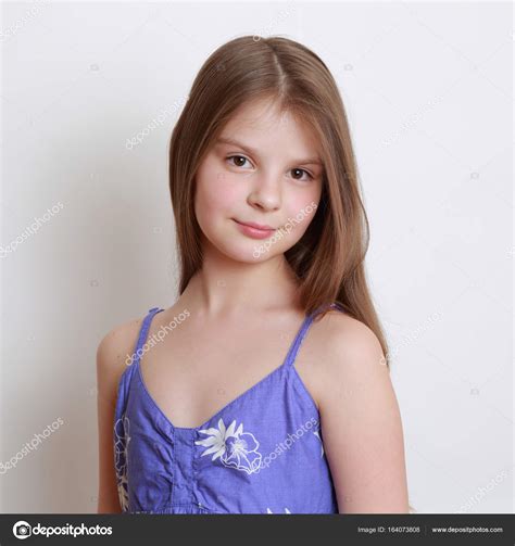 Cute teen girl Stock Photo by ©Mari1Photo 164073808