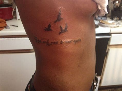 Cute tattoo saying "we only part to meet again"