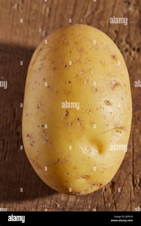 fresh raw yukon gold potato stock photo alamy