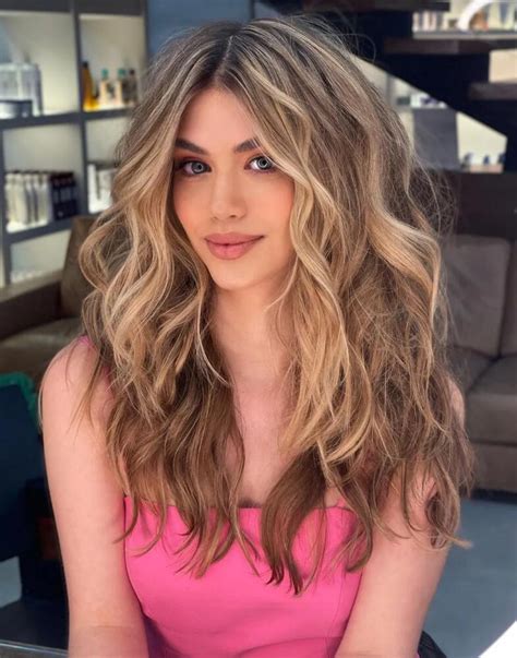 flattering middle part hairstyles  women hairstyles weekly