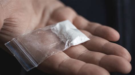 Alleged Drug Dealer Stapled Cocaine To Business Cards