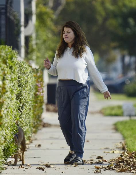 Yasmine Bleeth is spotted on a rare outing with husband Paul Cerrito in