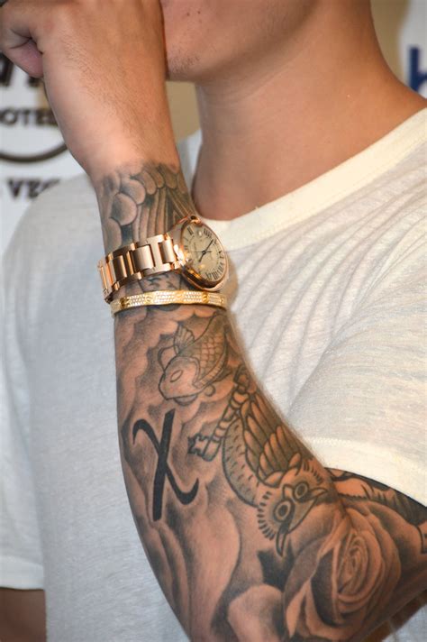 Justin has a bolded "X" on his left arm. "X means unknown," Justin