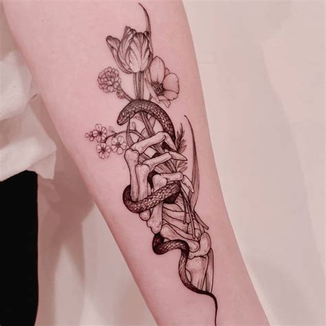 23 Skeleton Hand Tattoo Ideas To Connect With The Afterlife