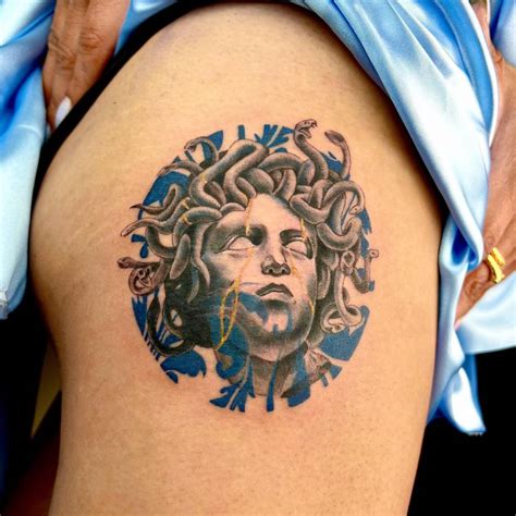 Porcelain Medusa portrait tattoo located on the hip.