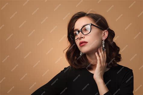 premium photo elegant model wearing glasses
