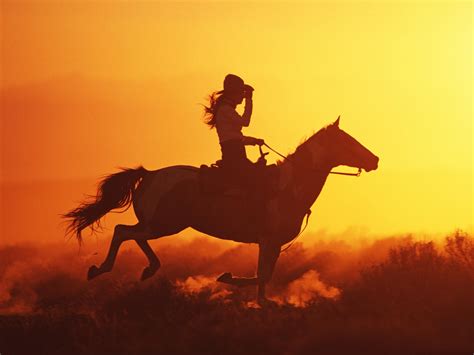 Sunset Rider: The Graceful Cowgirl in Motion HD Wallpaper
