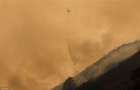 Terrified families flee Big Sur homes as wildfires engulf nearly 1,000 acres and close in on ...