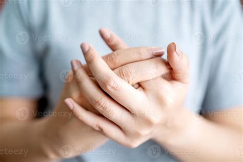 Woman having pain in knuckles and hands. Health care and medical