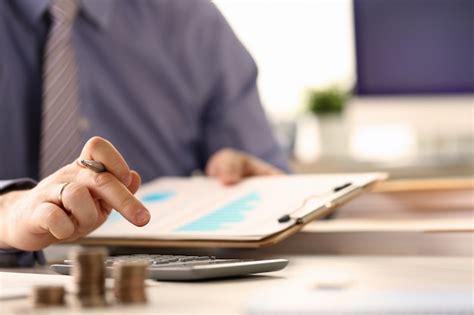 premium photo booker calculate finance budget tax report concept