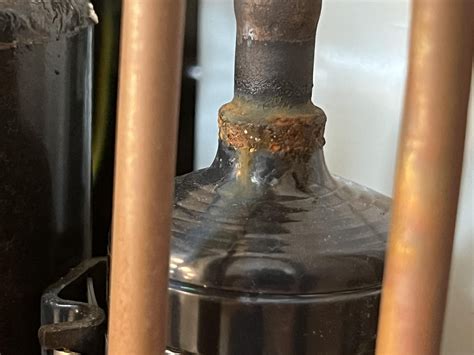 Is this GE Air Conditioner Compressor Possibly Leaking? : r/fixit