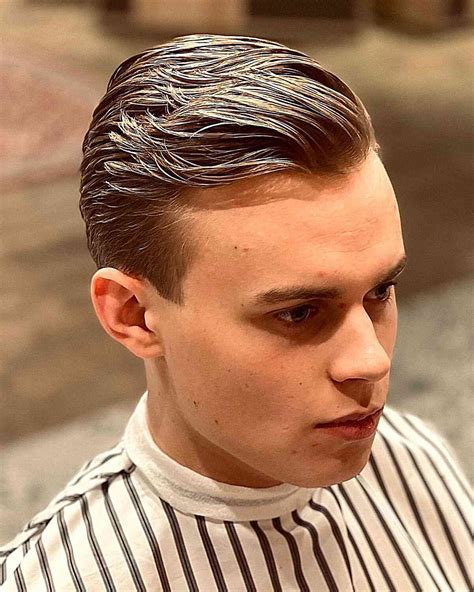 20 Modern Comb Over Fade Haircut Styles for Men in 2024 28