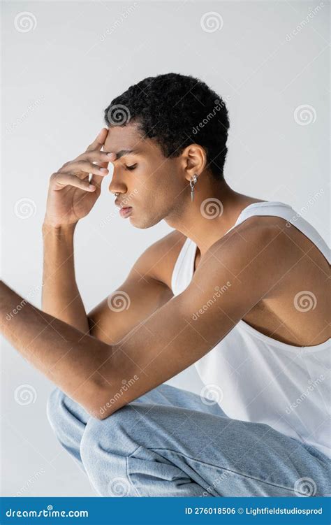 side view  young african american stock photo image  blue posing