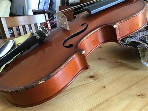 My banged up violin and one broke amateur who can’t replace it. Don’t