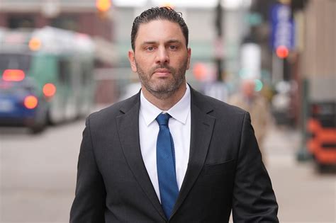 Ex-Michigan football coach asks judge to dismiss part of hacked images